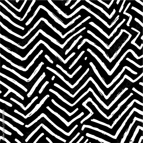 Abstract zigzag pattern with white brush strokes on a black background creating a dynamic design