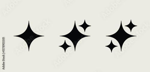 Minimalist black four pointed stars sparkle icons on light beige background