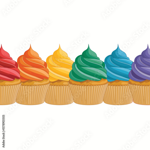 Row of colorful frosted cupcakes in rainbow order on a white background