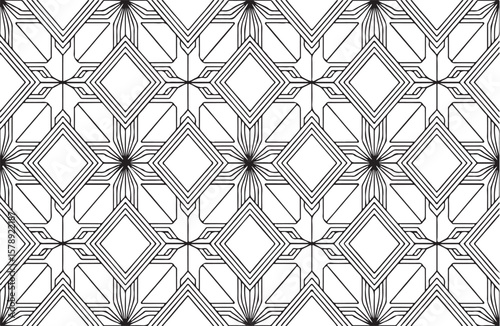 Geometric black and white seamless pattern with interlocking diamonds and floral elements