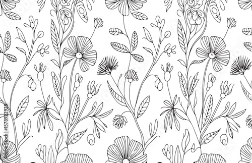 Seamless hand drawn floral pattern with delicate flowers and leaves in black and white.