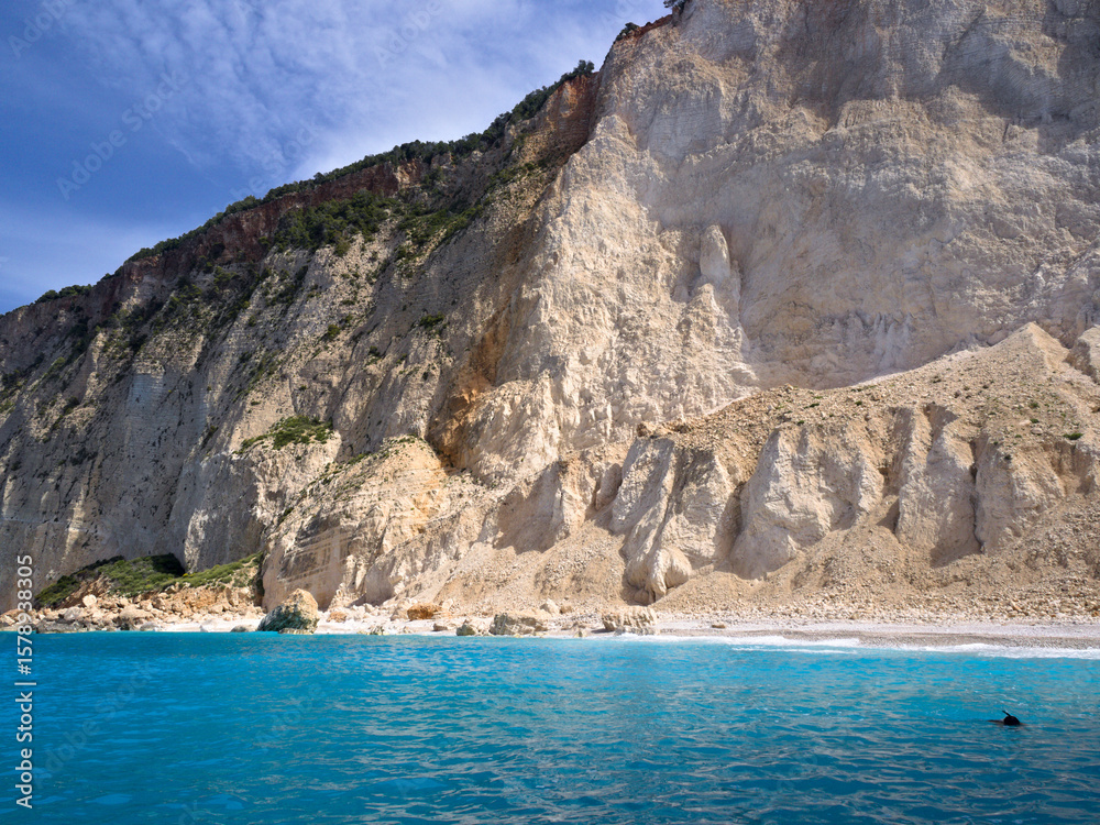 Fototapeta premium View of Mizithres Beach from the sea, Zakynthos Island, Greece. Ideal for Mediterranean travel, summer escape, or coastal nature-themed projects.