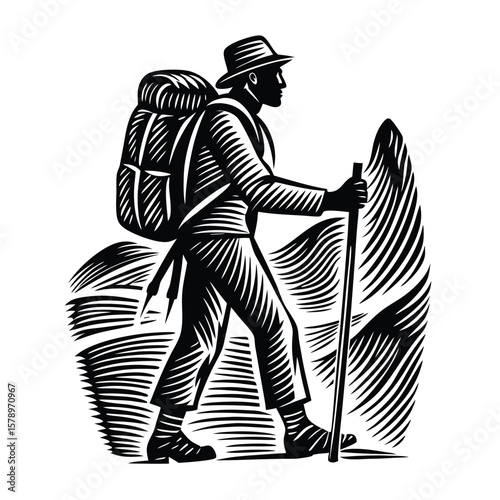 Hiker with backpack and walking stick mountain