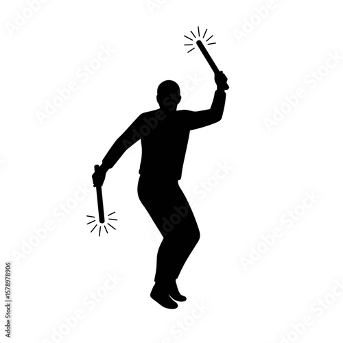 Silhouette of a person celebrating with sparklers: A captivating silhouette portrays a person filled with excitement, dancing and waving sparklers in the air.