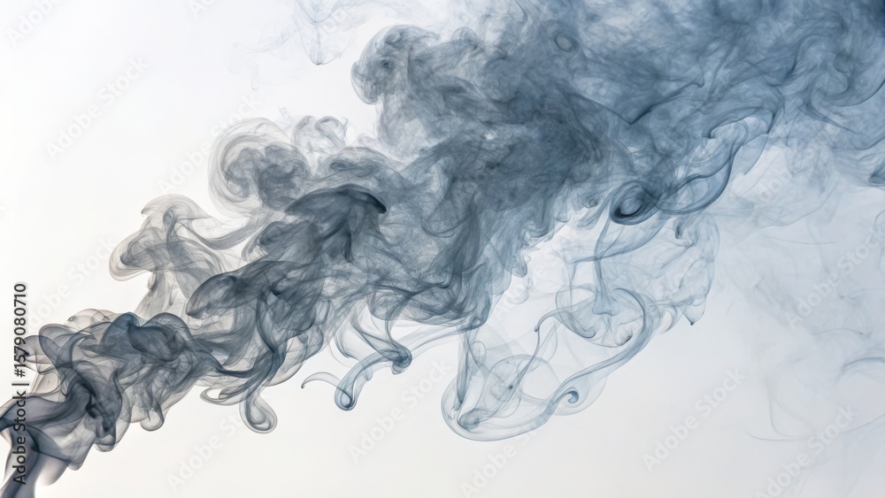 Fototapeta premium Wisps of dark smoke curl and swirl gracefully against a white background, creating an abstract, ethereal pattern.
