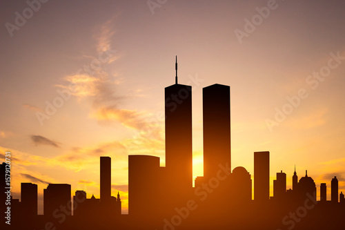 New York skyline silhouette with Towers against the sunset. Patriot Day banner. 9.11.2001
