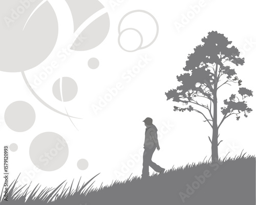 Silhouetted figure walking past tree on grassy hill design with transparency