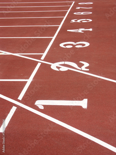 Eight lane running track with starting numbers