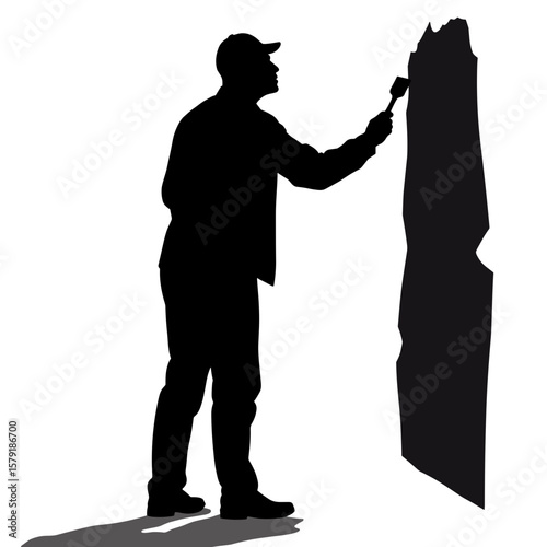 Man painting wall silhouette with brush in minimalistic style  