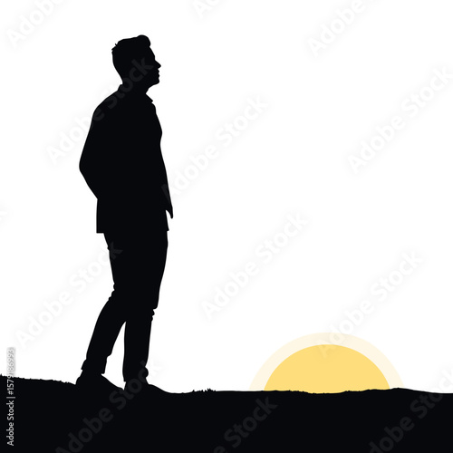 Silhouette of a man standing on hilltop at sunset  