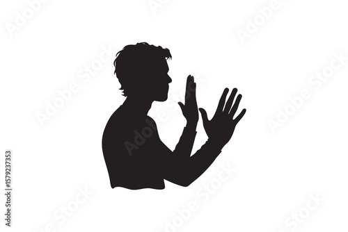 Silhouette of a man with raised hands as if pushing or interacting with a transparent surface set against a clean white background creating a sense