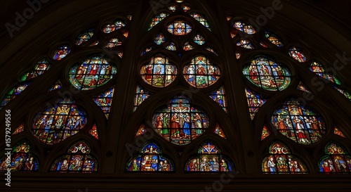 Intricate Stained Glass Window in Historic Church or Cathedral Interior