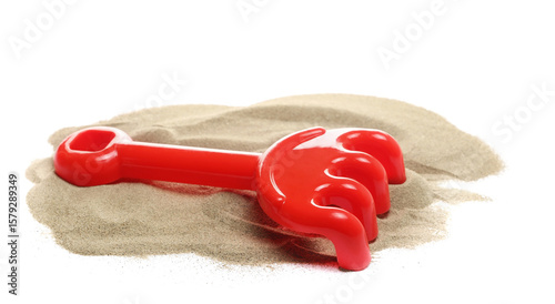 Wallpaper Mural Plastic red rake, beach toy for kids in sand, isolated on white background Torontodigital.ca