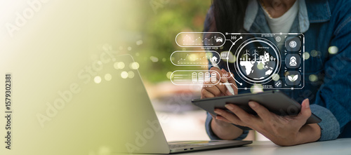 Woman analyzing digital sustainability data on tablet, with infographic of green technology, energy efficiency, eco innovation, environmental responsibility, and smart resource management system.