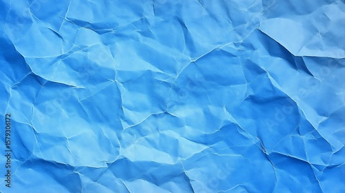 Abstract textured light blue background with paper folds perfect for design elements