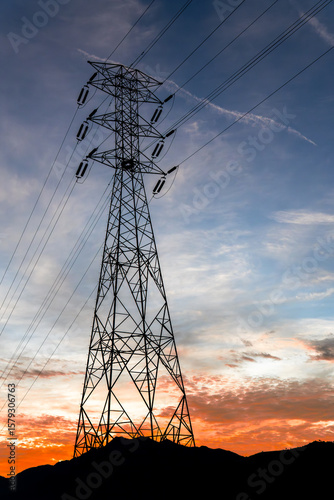 High voltage tower in the sunset