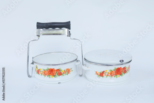 traditional old classic steel made food container. rantang. isolated on white background.