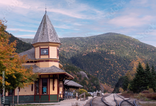 Train tracks alongside Crawford Notch train depot in White Mountains of New Hampshire. The historic passenger station, with its Queen Ann style architecture, is located in Crawford Notch state Park.