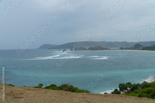 Photos Scenic ocean view from Merese Hill in Lombok, Indonesia