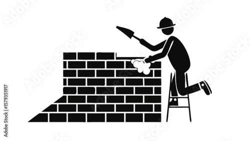 Construction worker bricklayer building brick wall with trowel and mortar construction industry professional
