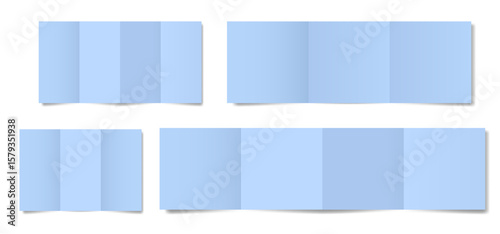 Set of light blue folded paper sheets. Double gate fold. Vertical pages. Blank booklet. Four panel accordion fold