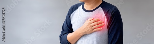 Wallpaper Mural Man with Hand on Chest Experiencing Pain in Heart Area and Expressing Concern About Health and Well-being Torontodigital.ca