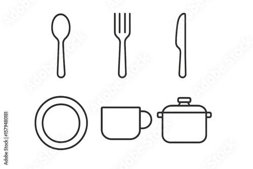 Utensils and cookware arranged in a modern kitchen setting creating a minimalistic dining atmosphere