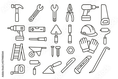 Collection of construction tools including hammers, drills, and safety gear arranged for easy access in a workshop setting