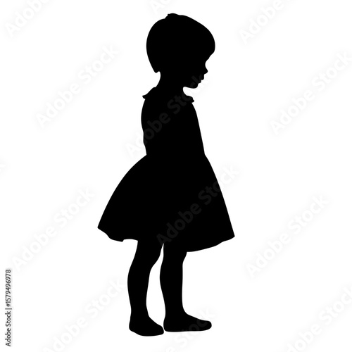 Silhouette of a child in a dress standing sideways  