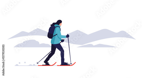 Snowshoeing. Man skiing in winter landscape with mountains in background  