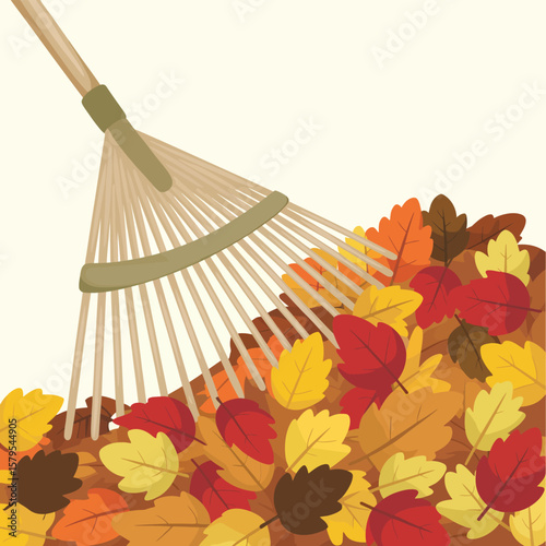Rake gathering colorful autumn leaves in a pile for yard work
