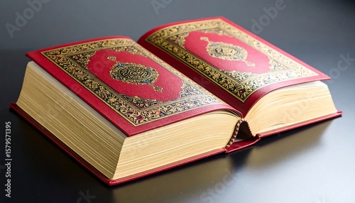 Open book, ornate cover, gold pages