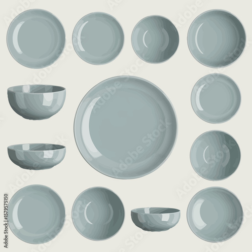 Collection of modern light blue ceramic plates and bowls arranged on a light background