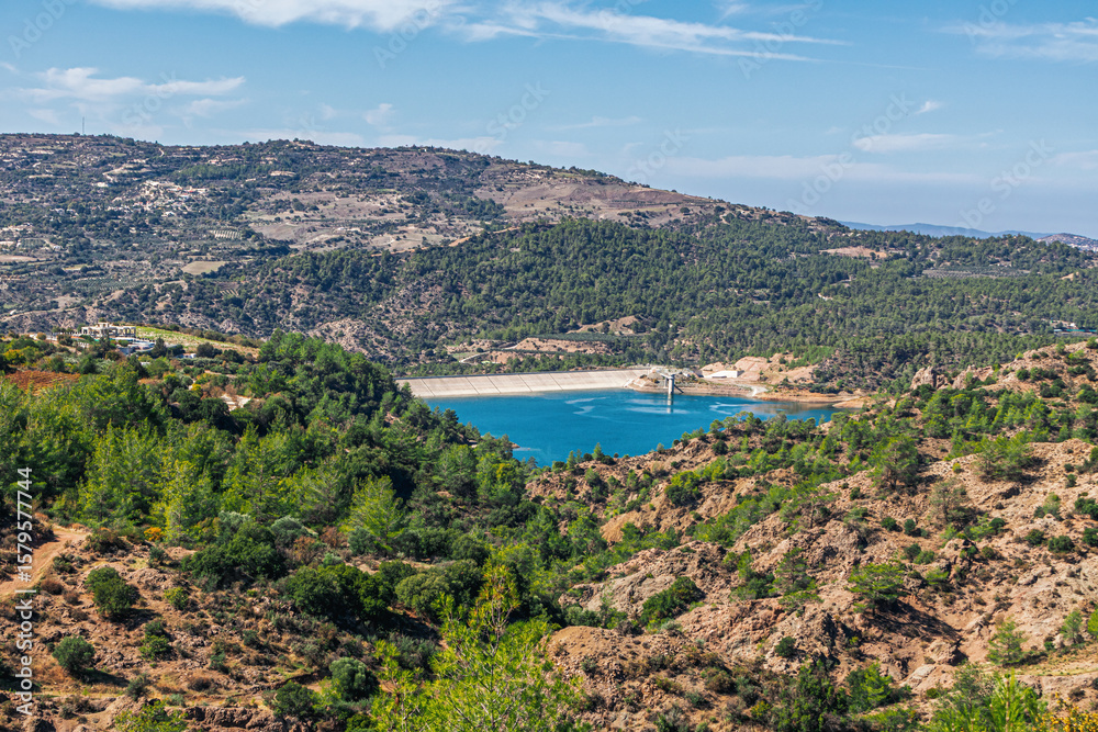 Obraz premium View of a reservoir high in the mountains. Mountain landscape with an artificially created reservoir