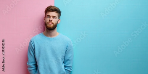 Stylish Young Man Posing Against a Colorful Background in Pastel Shades