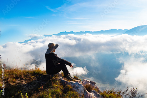 man on top of mountain