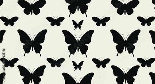 Elegant seamless pattern with butterfly silhouettes for backgrounds and designs