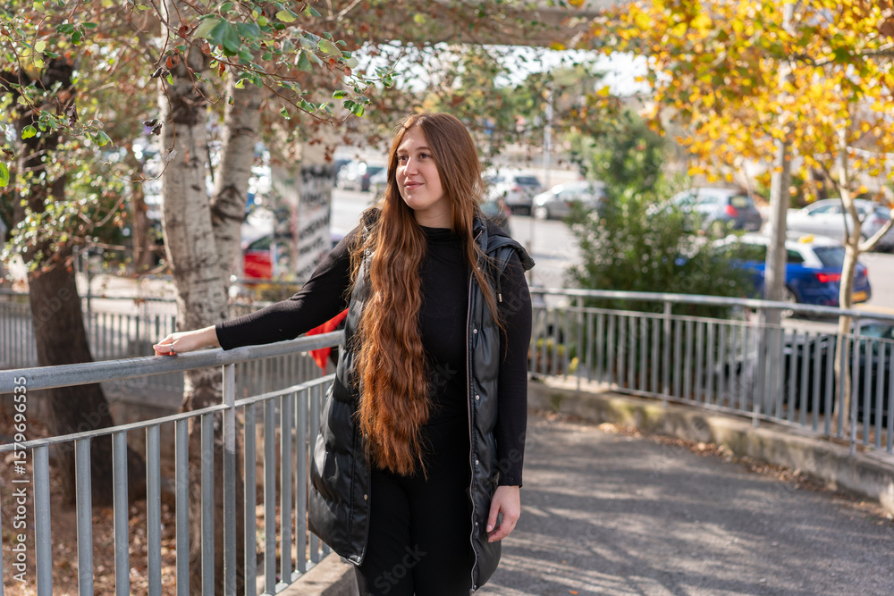 Fototapeta premium Unedited Portrait of a Young Woman Walking in the City – Facial Expressions Showing Various Emotions