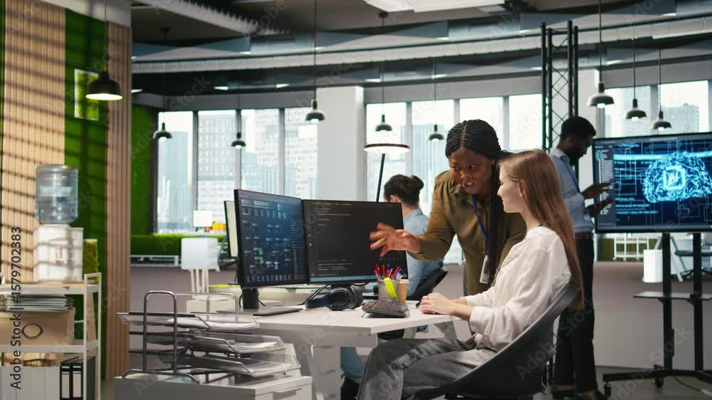 Pleased supervisor recognizing junior dev achievements at work, fostering positive office culture. Cheerful african american manager praising code written by female engineer, doing high five, camera A
