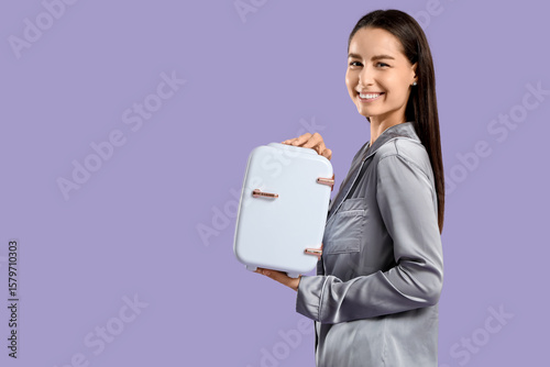 Happy young woman with smal...