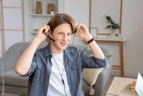 Teenage boy with headset wo...
