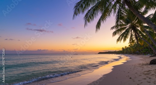 Serene tropical sunset over a pristine beach, palm trees silhouetted against vibrant sky.