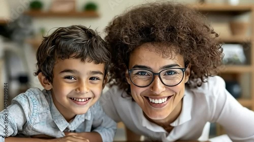Joyful Woman and Child Smiling Closeup in Bright Indoor Setting