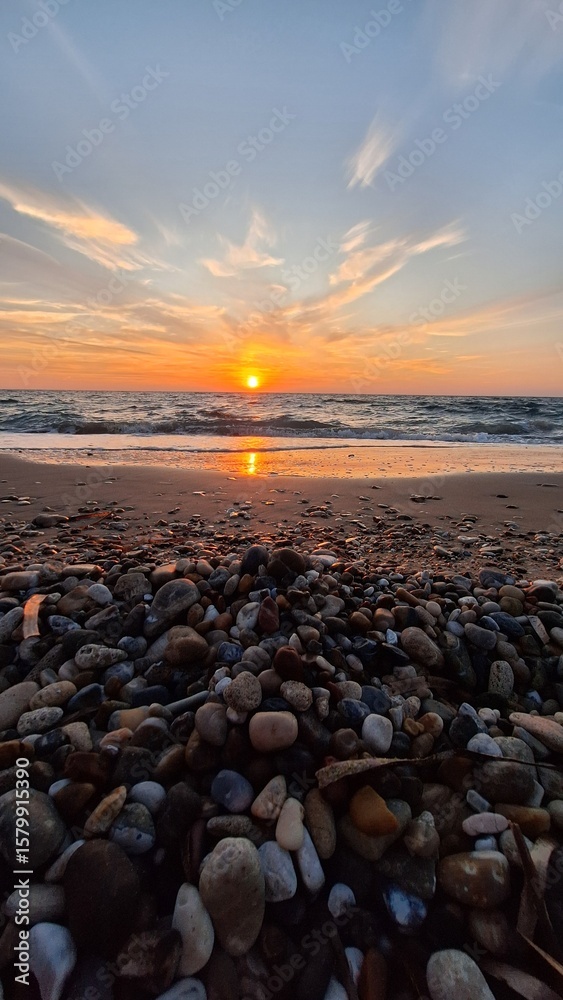 Obraz premium Footstep print on sand during sunset on beach, Preveza, Greece