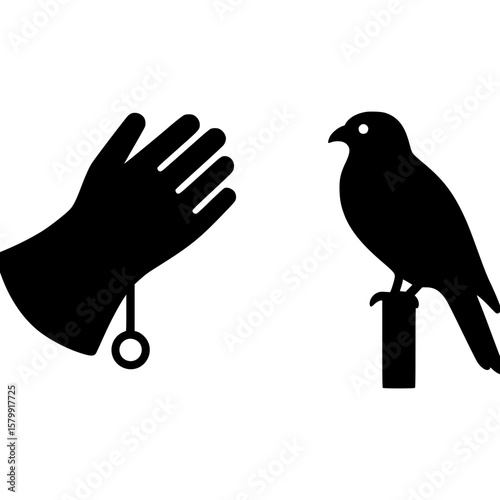 Iconic silhouette of falconry glove and bird of prey