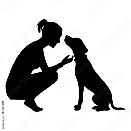 Woman and dog affectionate moment silhouette