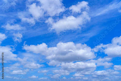 Cloudy blue sky on sunny day.