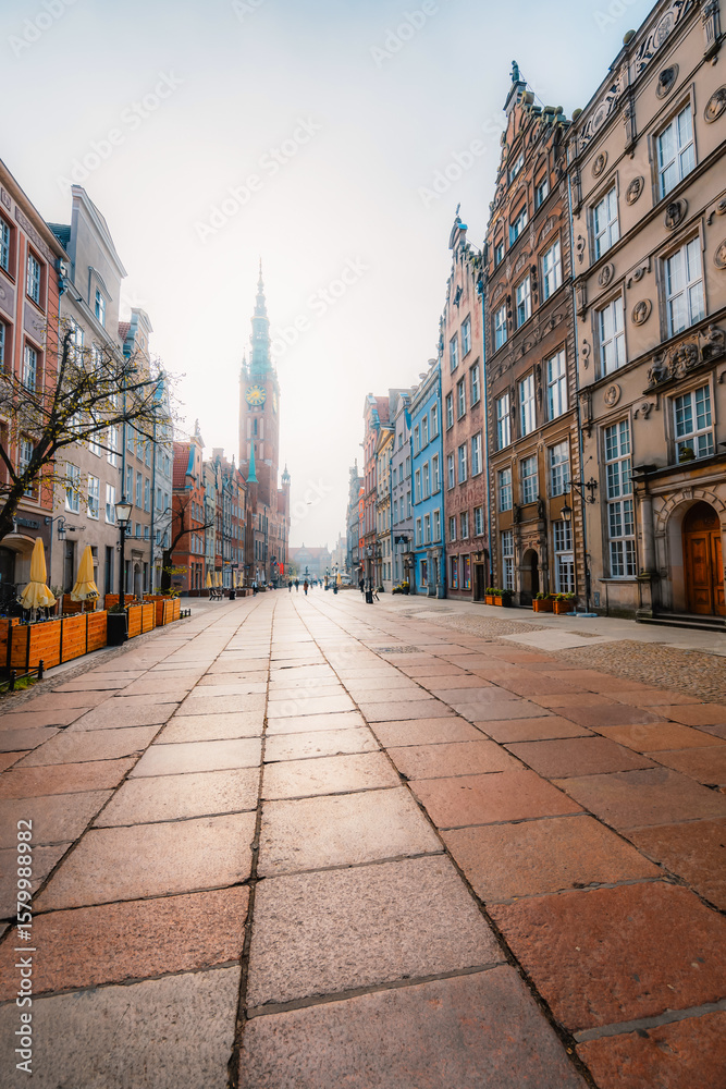 Obraz premium Gdansk with Motlawa river in Poland. Old town colourful house with saint Marys church i main square.