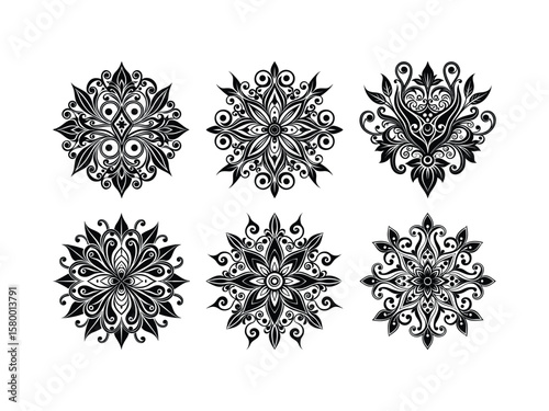 Black floral ornamental elements with swirling leaves and petals decorative