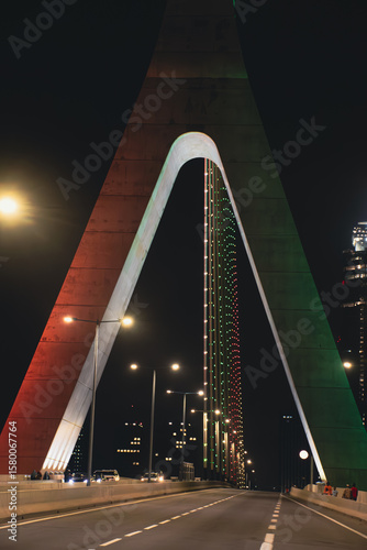 Obraz na plátně Alassane Ouattara Bridge at night – Focus on the illuminated arch in Abidjan